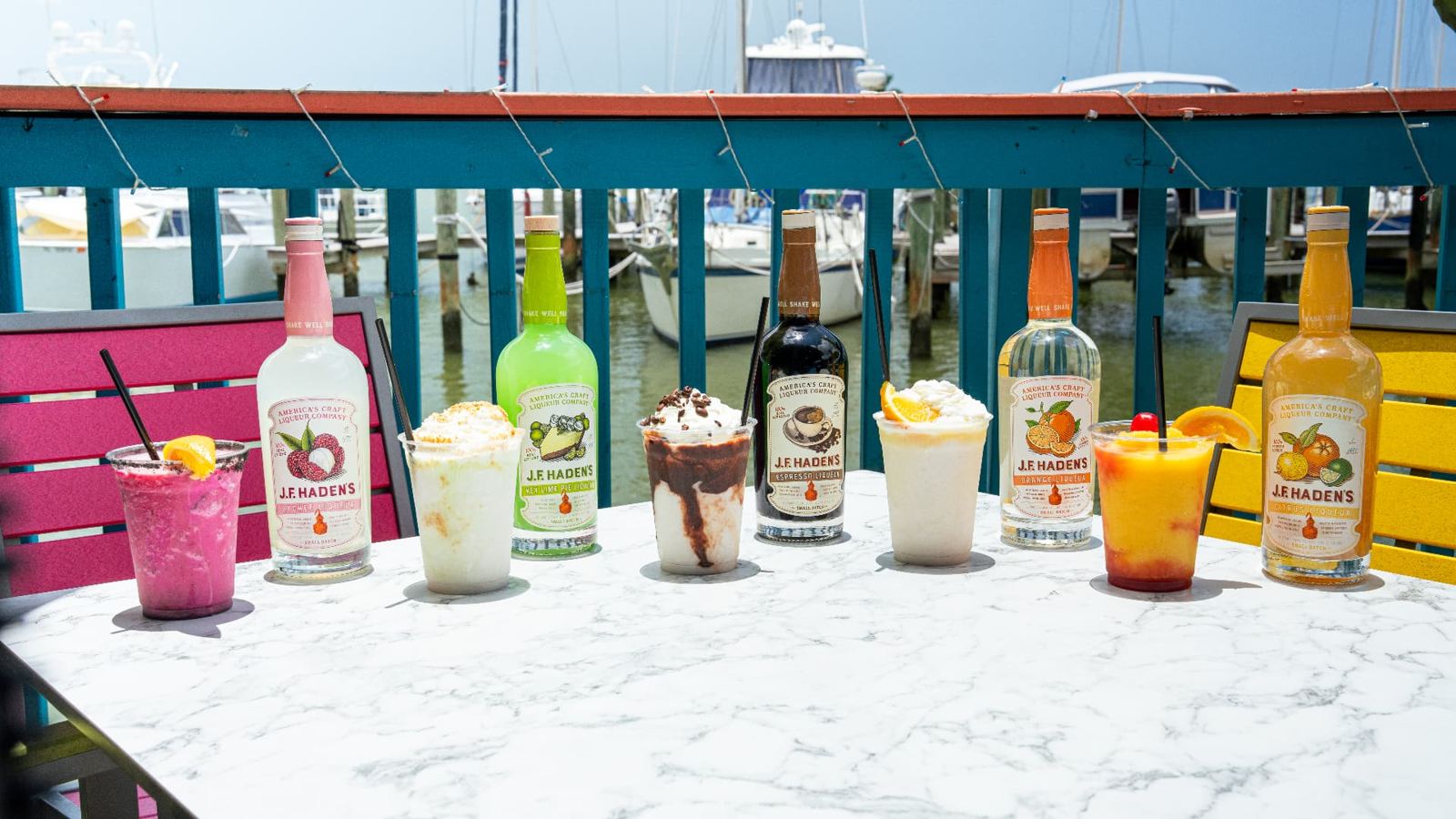 Lineup of frozen cocktails with J.F. Haden's liqueurs at the marina